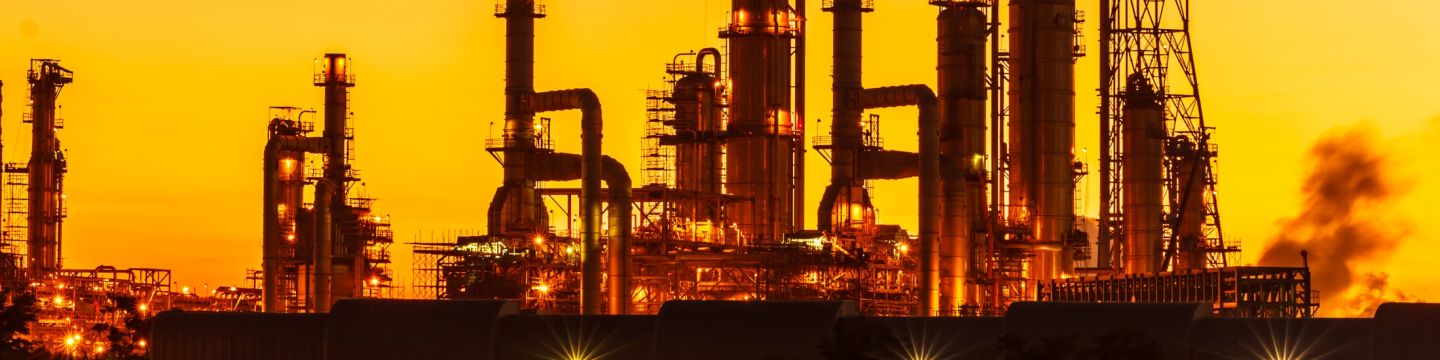 Getty Images 623282562 oil refinery at twilight
